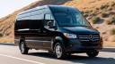 black Mercedes sprinter van on the road with (1)