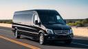 black Mercedes sprinter limo on the road make the image hd